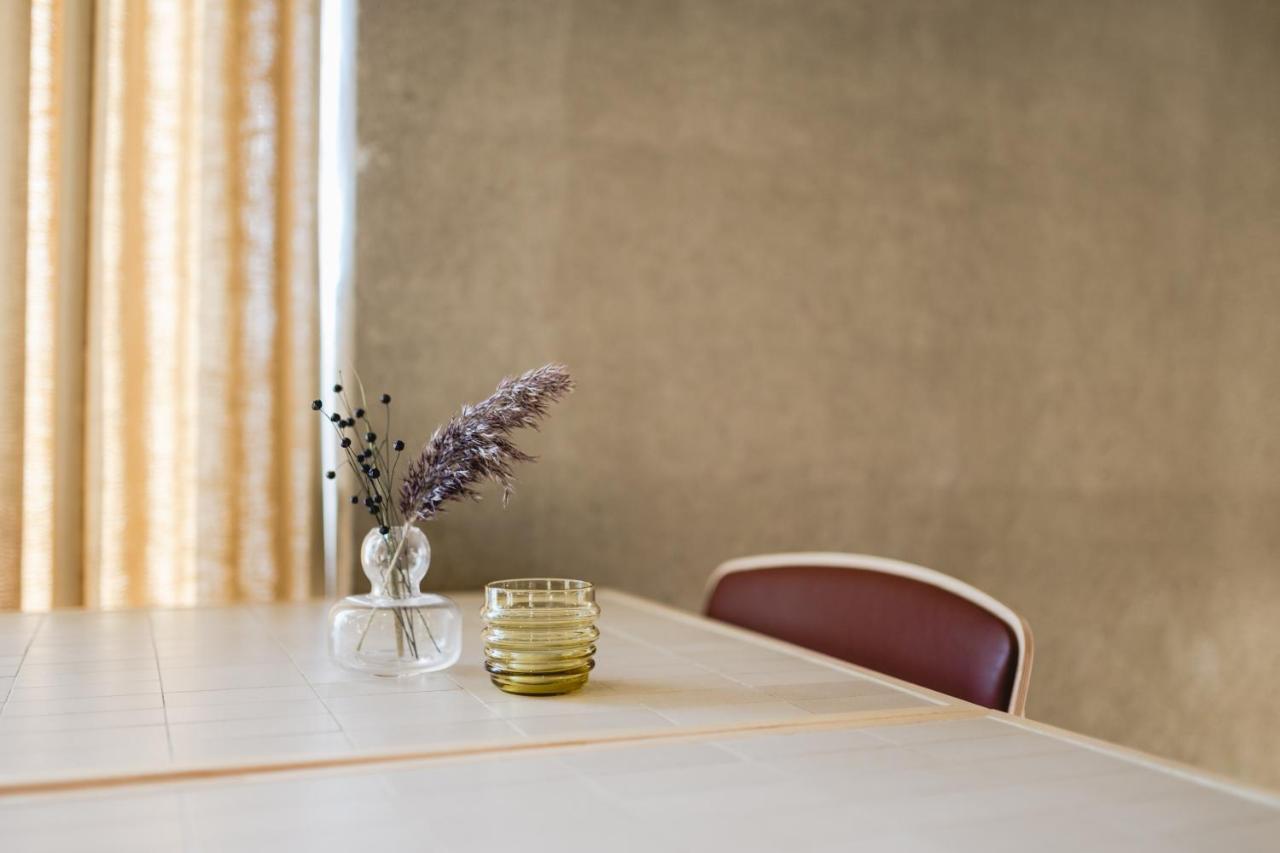 Valo Hotel & Work Helsinki Esterno foto "The table is set for the meeting"